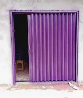 Folding gate rolling door