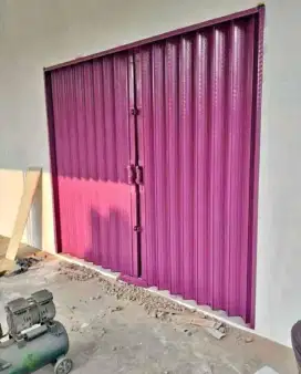 Folding gate rolling door