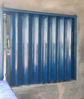 Folding gate rolling door