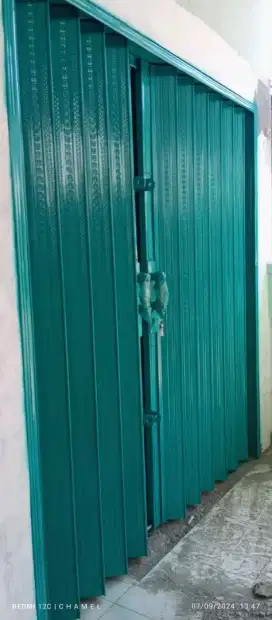 Folding gate rolling door