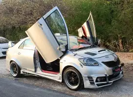 Toyota Vios bodykit, warna silver metalik, tahun 2012, di dps