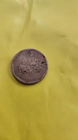 Koin Lama 100 rupiah kuning