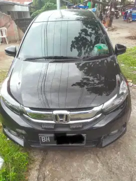 mobilio dijual. karna dah dapat ganti. mobil ada asuransi all rick.