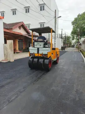 Pengaspalan dan marka jalan