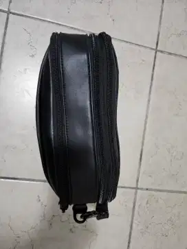 Tas tangan kulit TUMI