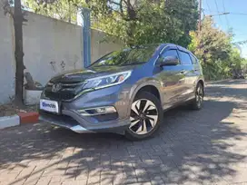 Honda CR-V 2.4 Prestige Bensin-AT 2015 Abu-Abu ZR