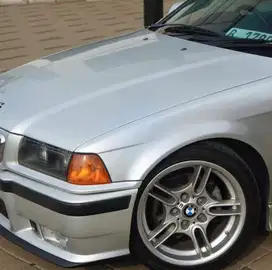 BMW 323i 1997 Bensin