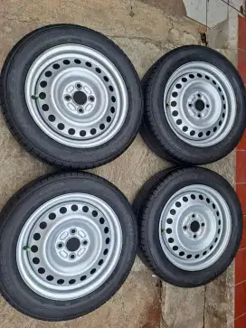 Velg Kaleng R15 4x100 +Ban Falken 90%