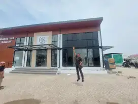 KACA FILM GEDUNG BERGARANSI