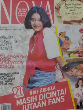 TABLOID TEMA NIKE ARDILLA