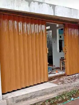 Folding gate rolling door