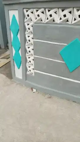 Tukang bangunan harian dan bangunan