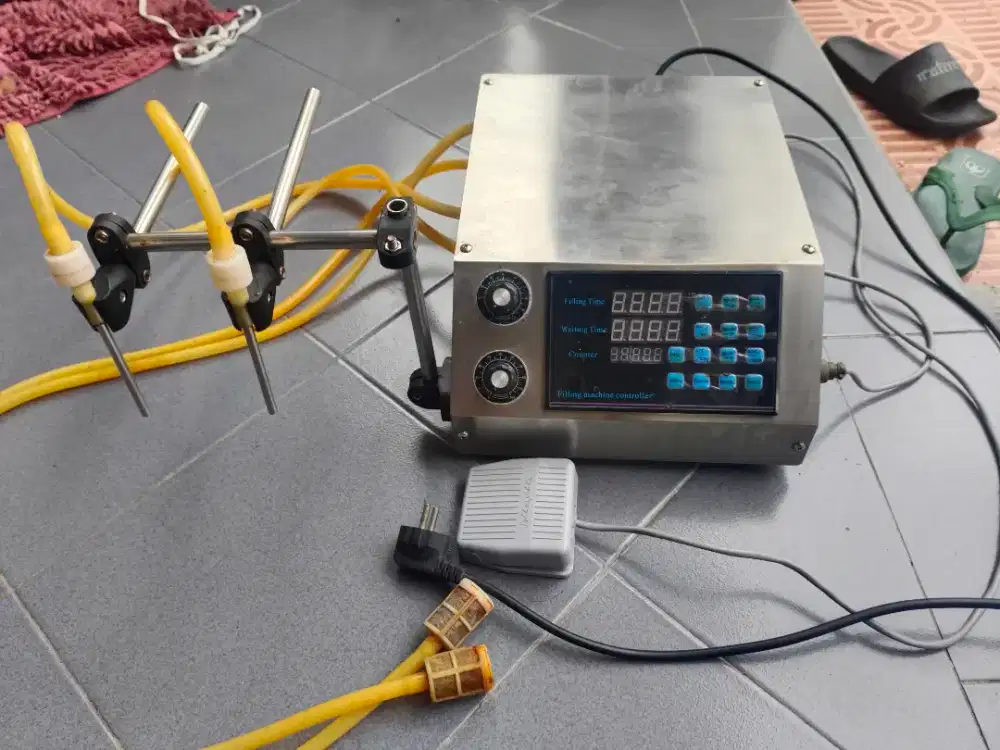 Mesin pengisi cairan otomatis ( auto liquid fiiling machine)