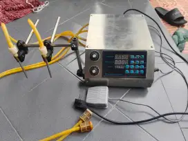 Mesin pengisi cairan otomatis (liquid fiiling machine)