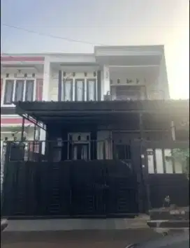 Rumah minimalis tingkat bebas banjir di jl dr. ratna , jatibening