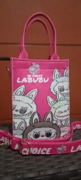 di jual tas labubu pink