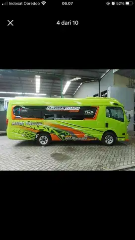 SEWA ELF HIACE BUS MEDIUM BUS PARIWISATA