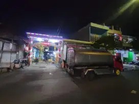 Air minum isi ulang per mobil tangki (9000 liter)