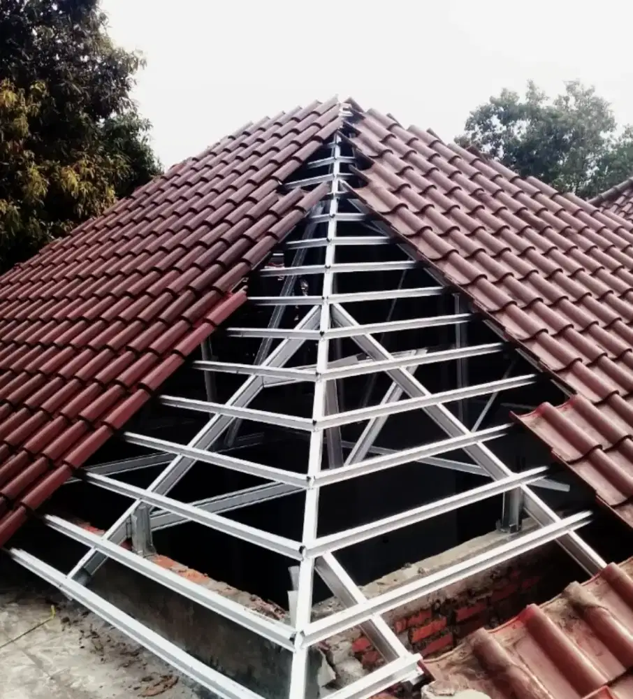 Bongkar pasang rangka atap bajaringan genteng keramik