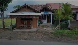 tanah bonus rumah kios jalan raya strategis