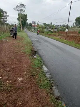 Tanah jln tanjungsari-rancakalong ke pintu tol 2,5 km