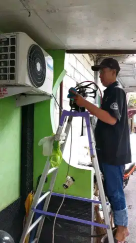 SERVICE AC BONGKAR PASANG AC