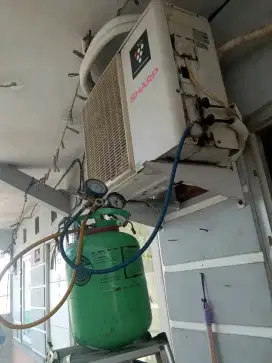 SERVICE AC BONGKAR PASANG AC