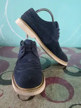 Sepatu Wingtip tapak busa