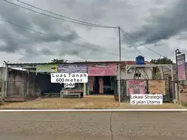 RUMAH BERIKUT KIOS DENGAN KEBUN BUNGA ANGREK DI JL RAYA CISEENG