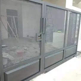 pagar rumah plat bolong
