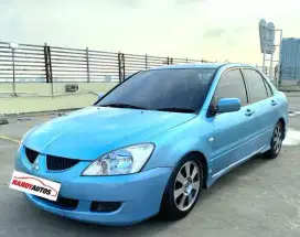 Mitsubishi Lancer 1.8 Tahun 2004 Manual Biru Muda Metalik