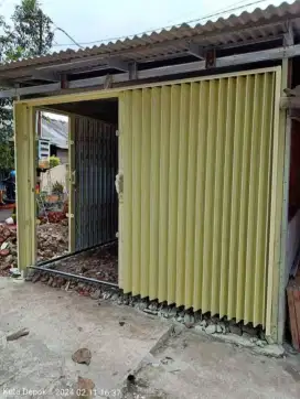 Folding gate rolling door