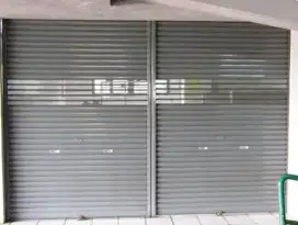 Tukang reparasi service rolling door folding gate murah