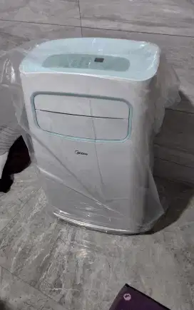 Jual AC portable midea 1.5PK bekas,kondisi seperti baru jarang pake