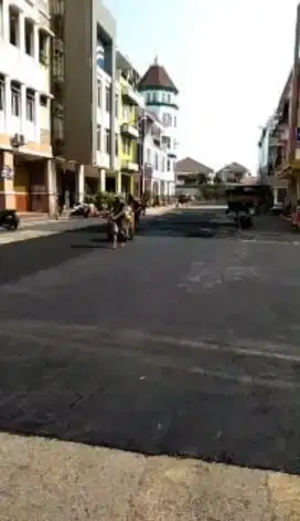 Aspal hotmix jalan Andara