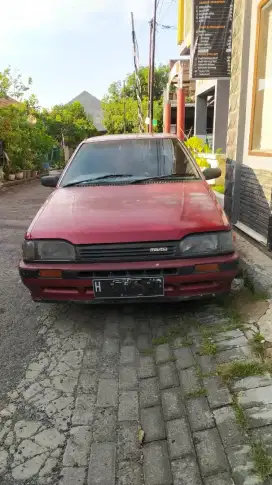 Mazda 323 Trendy (merah) - thn 1989