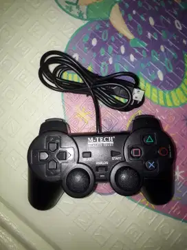Game pad M-TECH Quality Trust single hitam.