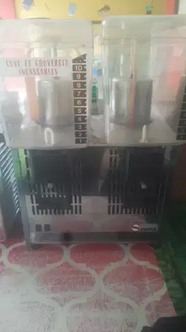 Mesin juice dispenser