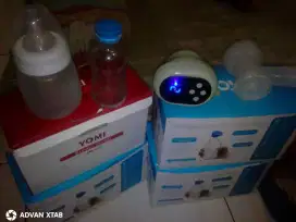 Pompa Asi Elektrik Merk Yomi dan Botol Asi