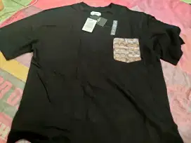 Baju kaos c*ach