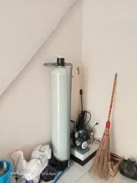 Pemasangan filter air dan instalasi pipa dan pompa air