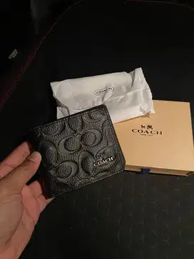 Dompet coach embos