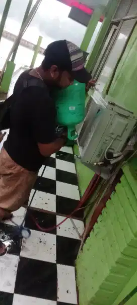 Bongkar pasang ac