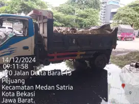 Buang puing sampah