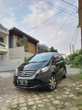 DP 20 JT !! MPV NYAMAN 3 BARIS. FREED E PSD 1.5 MATIC 2009 TERAWAT