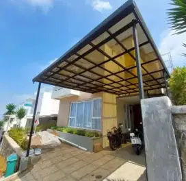 Kanopi solarflat 1.2 mm rangka baja ringan terpasang