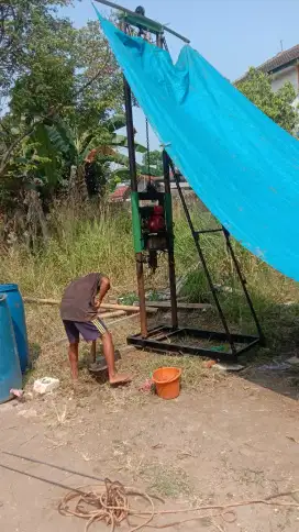 Tukang sumur bor air