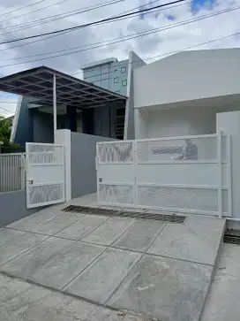 Pagar rumah plat lubang moderen