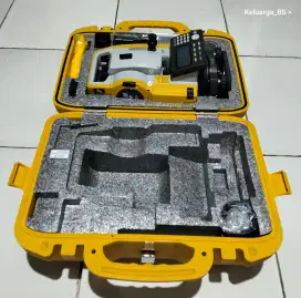 Total station Topcon es - 65 bekas aksesoris baru