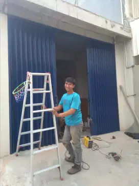 rolling door kanopi serpis baru